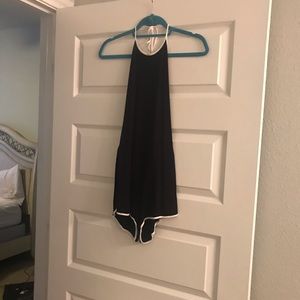 Black romper with white lining
